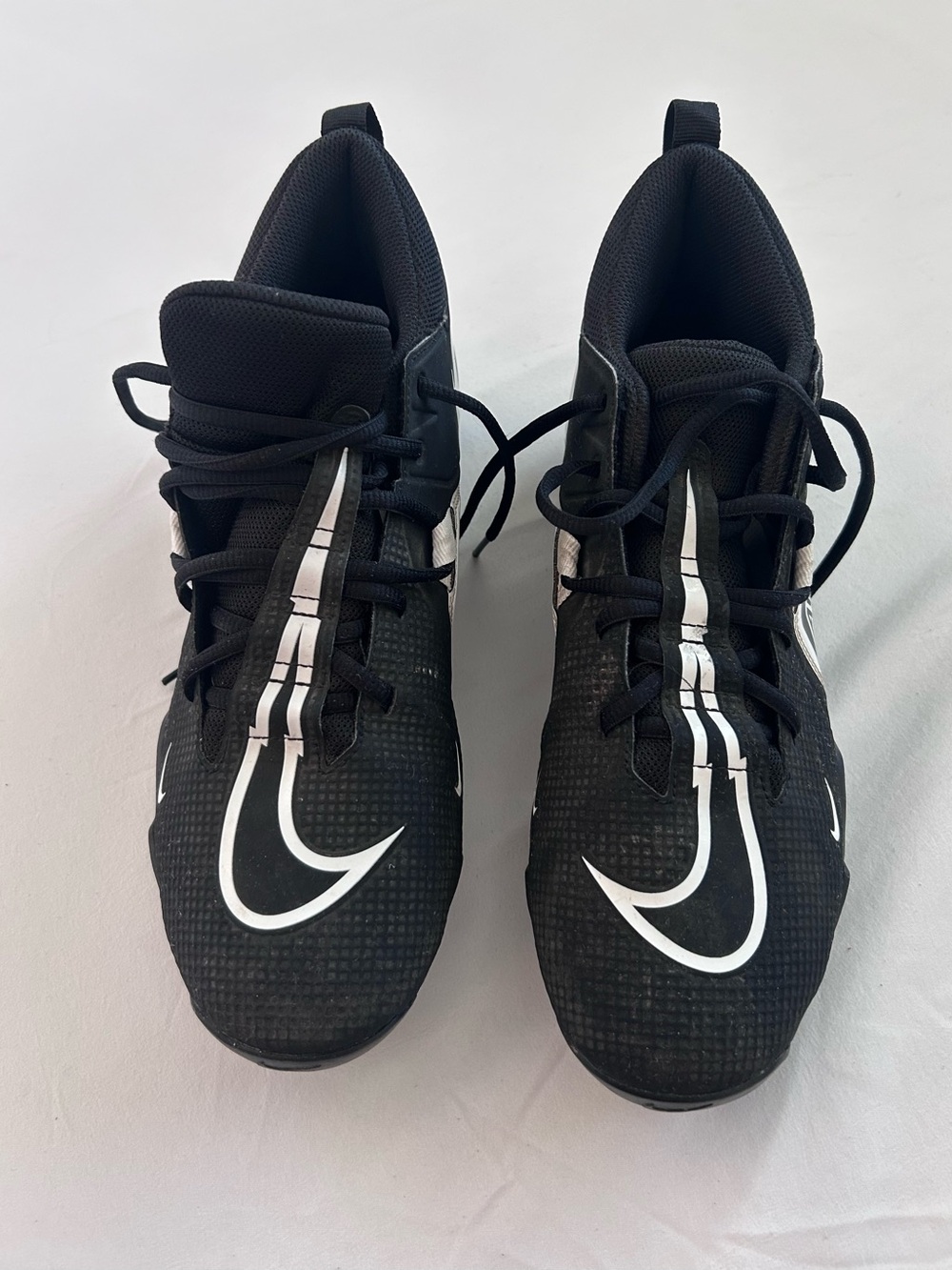 Nike Menās Black football cleats